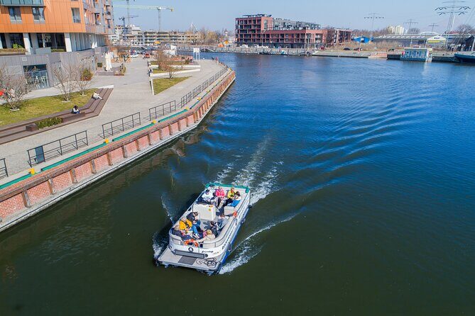 Cruises on the Motlawa River by a luxury catamaran - Gdańsk from the water side - The ride experience: luxury catamaran, cozy flow, and English audio