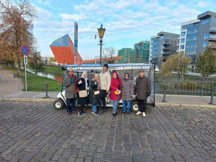 Gdansk: City Sightseeing Tour by Golf Cart/Buggy Guided Tour - Guides, language options, and the value of live Q&A