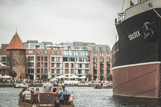 Gdansk Guided City Cruise on Historical Polish Boat - Docking at Dokowa 1: shipyard energy before the Old Town