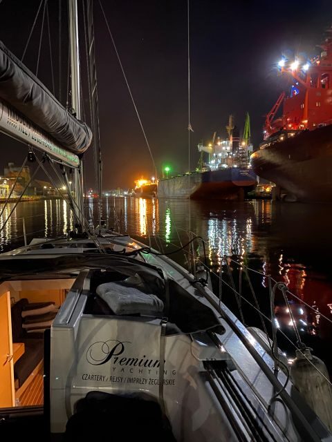 Gdansk: Scenic Evening Yacht Cruise with Welcome Drink - Port of Gdańsk Canal: Ships at Work, Not Just Stopped for Photos