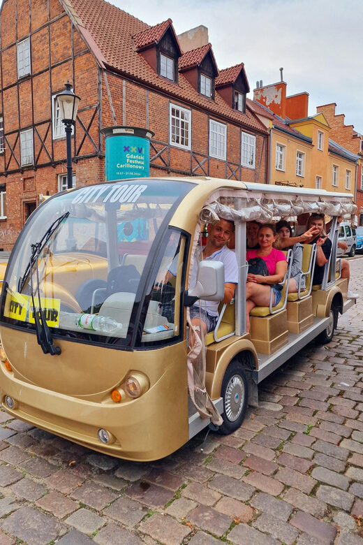 Gdansk: Shared or Private City Tour Sightseeing By Golf Cart - Guides, storytelling, and language support that actually helps