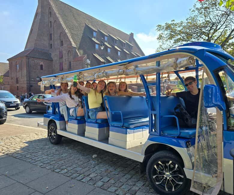 Gdansk:Private Beer City Tour Sightseeing By Golf Cart - Gate-to-prison-and-royal stops: the Old Town’s power story