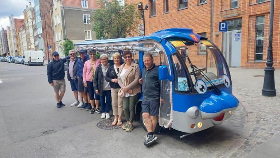 Gdansk:Private Beer City Tour Sightseeing By Golf Cart - Churches, chapel, and the crane: where religion meets trade