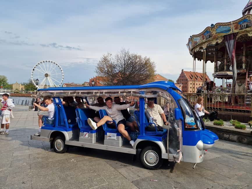 Gdansk:Private Beer City Tour Sightseeing By Golf Cart - The guide experience: humor, Q&A, and audio that keeps up